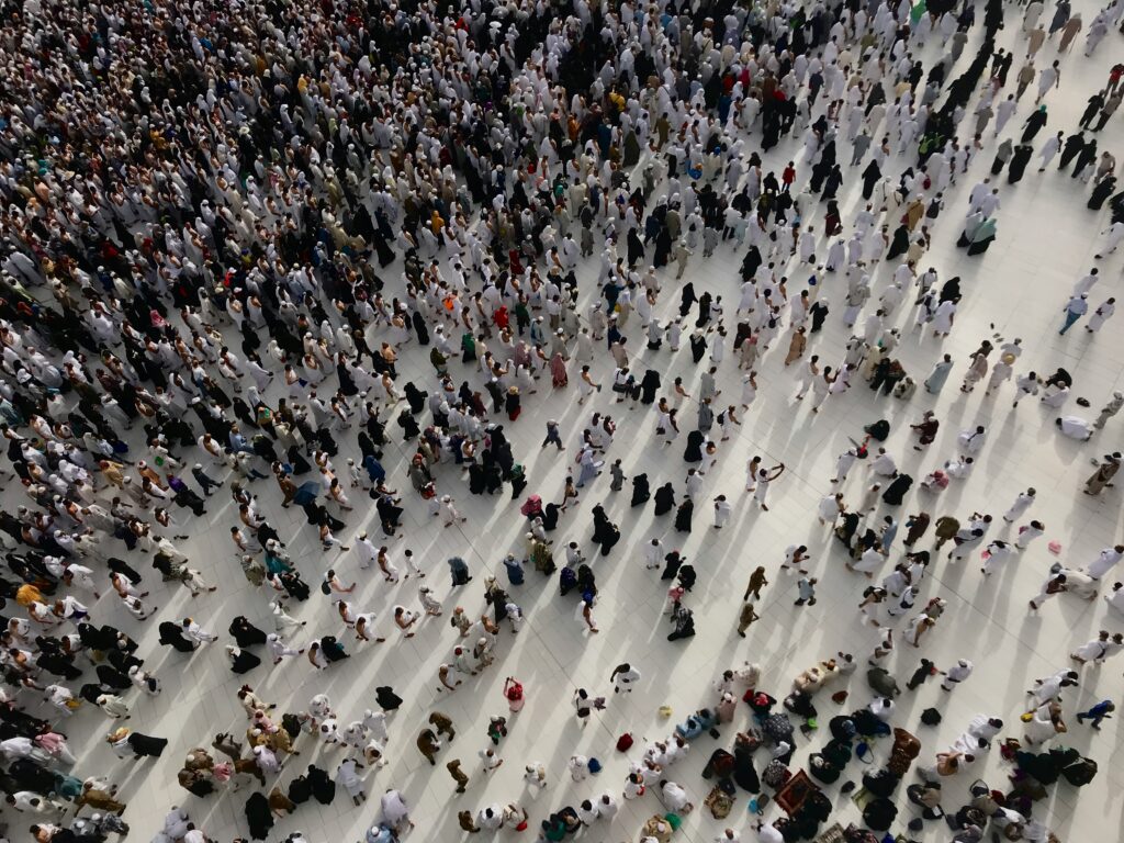 Lots of people walking, viewed from above