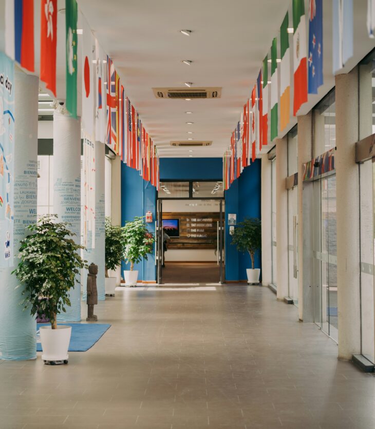 University coridoor with flags